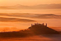 Sunrise over "The Belvedere" (Tuscan farmhouse) and the Val d'Orcia, San Quirico d'Orcia,Tuscany, Italy April 2010