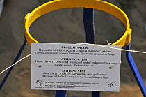 Warning sign and protective cage over nest site of Loggerhead Turtle (Caretta caretta) Platanias, Crete, Greece. July 2010