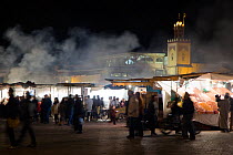 Busy market at night, Marrakech, Morocco, February 2010.