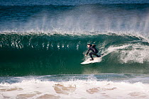 Surfer on a wave in Booby's Bay, Cornwall, England, August 2010.