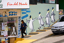 Mural of Emperor penguins descending stairs on a pavement in Ushuaia, Argentina, February 2009.