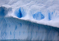 Deep shaded fissures in an iceberg, Antarctica, February 2009.