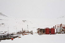 Abandoned whaling station at Grytviken, covered in snow, South Georgia, 2009.