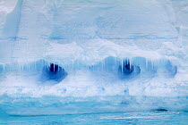 Icicle fronted caves in an iceberg, Antarctica, 2009.