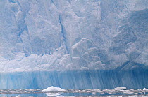 Layers visible on iceberg indicate that it has rolled 90 degrees. Antarctica, 2009.