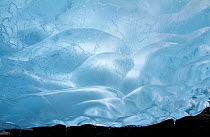 Ripples at the centre of a clear piece of glacier ice, Antarctica, 2009.
