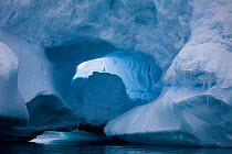 Ice arch in iceberg, Cierva Cove, Antarctica, 2009.