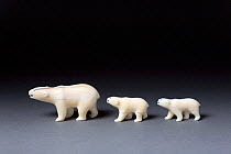 Polar bear and cubs carved from walrus ivory. Thule, Northwest Greenland.