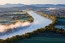 Aerial view of mist rising from the Connecticut River at dawn as seen from South Sugarloaf Mountain in the Sugarloaf Mountain State Reservation, Deerfield, Massachusetts, USA, October 2006