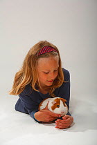 Girl and Guinea Pig