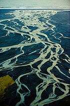 Aerial view of river delta, black volcanic sand, South Iceland, April 2010