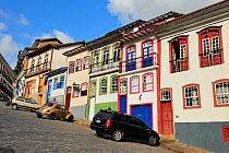 Street of colourful Brazilian Baroque houses, in the town of Ouro Preto (UNESCO World Heritage Site) Minas Gerais State, southeastern Brazil. March 2010