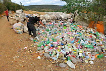 Recycling garbage in caatinga vegetation in the municipality of Boa Nova, southeastern Bahia State, Brazil. September 2010