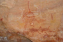 Rupestrian prehistoric paintings of running deer-like animals, thought to be 12,000 years old. Serra da Capivara National Park, municipality of Sao Raimundo Nonato, Piaua State, northeastern Brazil....