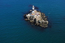 Aerialf view of the New Lighthouse, the Maidens, off the coast of Larne, County Antrim, Northern Ireland, UK, September 2009