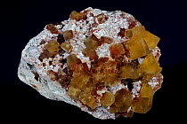 Fluorite (CaF2 - calcium fluoride), a halide mineral popular among collectors, used in aluminium refining, the steel industry and the manufacture of milk glass.