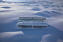 Snow covered bench on the Malvern Hills. Worcestershire, UK, February 2010.