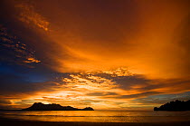 View of sunset and colourful skies, from the beach at Bako National Park, Sarawak, Borneo, Malaysia, June 2010
