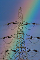 Rainbow behind electricity pylon and power lines, Ferrybridge power station. Yorkshire, England, UK, March 2008.