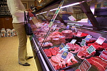 Interior of village butchers shop. Scotland, January.