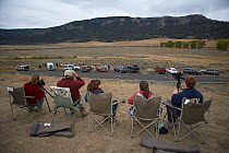 Wolf watchers looking out over Lamar Valley. Yellowstone National Park, Wyoming, USA, September.
