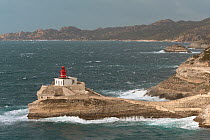 Phare de la Madonetta lighthouse on a windy day. Bonifacio, island of Corsica, France, February 2010