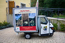 Van parked outside Hringer Muhle, a fomer mill, transformed into a visitor centre. Mullerthal Region, Luxembourg's Little Switzerland, Luxembourg, October 2009