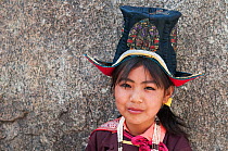 Portrait of a young Ladakhi girl, wearing a hat, Phyang, Ladakh, India, June 2010