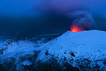 Ash plume and lava eruption from the Eyjafjallajokull volcano at night, Iceland, April 2010
