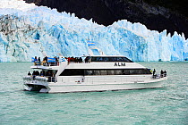 Tourists viewing Spegazzini Glacier from a ship, Los Glaciares National Park, Patagonia, Argentina, January 2006