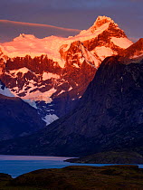 Paine Grande peak (3050 m) and Nordenskjold lake at sunrise, Torres del Paine National Park, Patagonia, Chile, January 2006