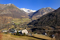View of Gedre village, Gave de Gavarnie valley and Soum de Diozede, Estragna, Bugarret peaks. Pyrenees mountain, Haute-Pyrenees, Gascogne, France, January 2011