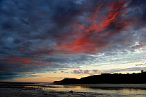 Stormy sky at outgoing tide and sunset, Bay of Fundy shores at Alma, New Brunswick, Canada, September 2010