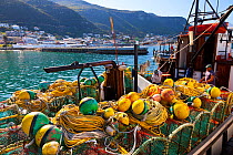 Fishing boat with lobster pots in the fishing village of Kalk Bay, False Bay, South Africa