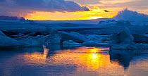 Sunset over the icebergs in Jokulsarlon Lagoon, Vatnajokull Glacier, Iceland, July 2009