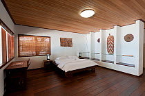 Bedroom in Sorido Bay Resort bungalow. Raja Ampat, West Papua, Indonesia, February 2010.