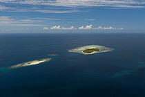 Aerial view of Arborek Island and neighbouring sand cay. Raja Ampat, West Papua, Indonesia, February 2010
