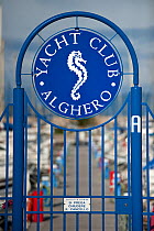 A seahorse symbol is used as the logo for a yacht club in Alghero, Sardinia, Italy, March. Seahorses typically favour the same sheltered bays that make excellent natural anchorages, which has led to c...