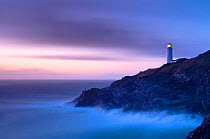 Trevose Head and lighthouse in the late evening light. Cornwall, UK, July 2010