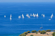 Sailing yachts racing in the Aegean regatta off the coast of Lesbos / Lesvos. Near Molyvos town, Greece, August 2010