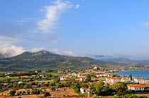 Overview of Petra village, with mist rising from mountains in the background after rain. Lesbos / Lesvos, Greece, August 2010