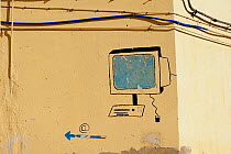Sign painted on wall advertising an internet cafe. Medina quarter, Fes, Morocco, December 2010.
