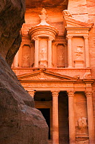 Al Khazneh or the "Treasury", view from the Siq (passage leading into the city). Petra, Nabataean Stone City, Jordan. A UNESCO World Heritage site.