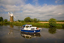 Boating on the River Ant, at How Hill, Norfolk Broads, Norfolk, UK