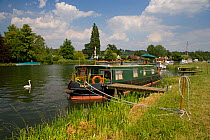 Longboat moored to the bank, River Thames, Buckinghamshire, UK