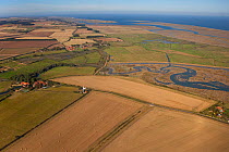 Aerial view of coastal farmland and saltmarshes, Burnham Norton and Scolt Head Island, Norfolk, UK