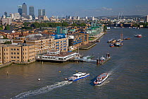 View from Tower Bridge, London, looking east over River Thames with Canary Wharf in the background, London, UK