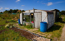 Caravan converted into shed on garden allotment, Wells-next-the-sea, North Norfolk, UK, August