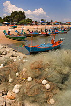 Fishing boats hauled up on beach, Cha-Am, Southern Thailand