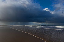 Grey clouds and white waves, Holkham Beach, north Norfolk, UK, November